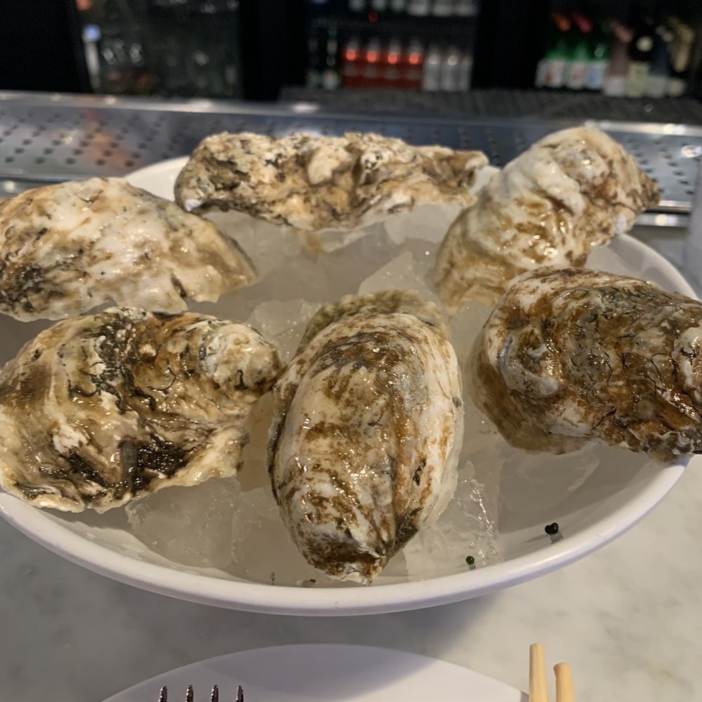 District One Kitchen and Bar - True Oysters connoisseur always flip over when done - Asian Fusion Near Me - Las Vegas, Nevada District One Kitchen and Bar - True Oysters connoisseur always flip over when done - Asian Fusion Near Me - Las Vegas, Nevada