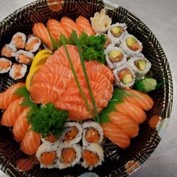Salmon amore.. 18 pc of salmon rolls 12pc salmon sushi,  12 salmon sashimi 42pc.  49.95$. Good price..