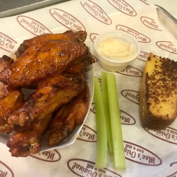Moe's Original Bar B Que - chicken wings, celery sticks, and a piece of bread - Barbeque Near Me - Montgomery, Alabama Moe's Original Bar B Que - chicken wings, celery sticks, and a piece of bread - Barbeque Near Me - Montgomery, Alabama