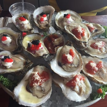 Tin Fish - Dirty oysters (Caviar) and grandpa oysters (Horseradish) - New American Near Me - Sunrise, Florida Tin Fish - Dirty oysters (Caviar) and grandpa oysters (Horseradish) - New American Near Me - Sunrise, Florida
