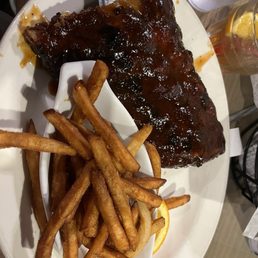 Half rack of ribs with fries Half rack of ribs with fries