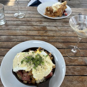 Cowfish - Corn beef hash + eggs Benedict with Nutella waffles - New American Near Me - Hampton Bays, New York