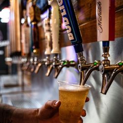 Axe Escape Axe Throwing  - Indulge in our selection of 15 beers on tap and refreshing margaritas on tap, adding a perfect touch to your axe-throwing escapade.