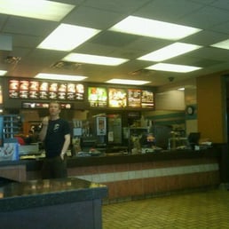 a man standing at the counter