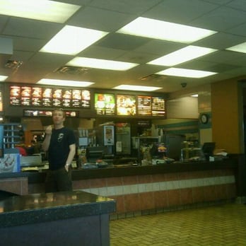 McDonald's - a man standing at the counter - Fast Food Near Me - Topeka, Kansas