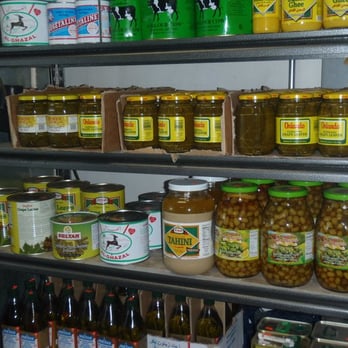 Koko Market - a shelf full of pickles, olives, and other condiments - International Grocery Near Me - Baltimore, Maryland Koko Market - a shelf full of pickles, olives, and other condiments - International Grocery Near Me - Baltimore, Maryland