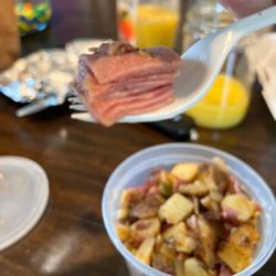 Prisco's Gourmet Deli and Caterer - That's the thin sliced "supposedly" corned beef that sat on top of one of the SIX containers we bought. Wasn't even mixed in the potato!!!!!