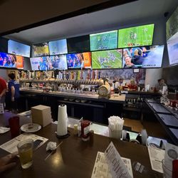 Buffalo Bros Sundance - View of some of the multitude of tv's from the bar.