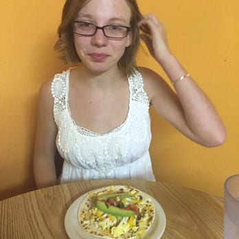 Mi Ranchito - Delicious breakfast taco- egg, cheese, avocado, cilantro and chorizo - Mexican Near Me - Austin, Texas