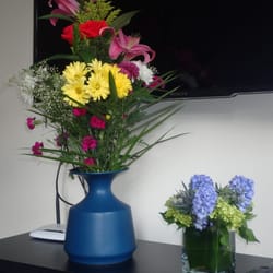 Blue Water Flowers - Prepurchased flowers on right from bluewater flowers,Lafayette, NYC. $65 Later purchased the flowers on left for $16. need i say more