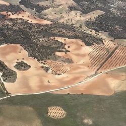 Iberia - Flying over spain (cute plane shadow on the land!)