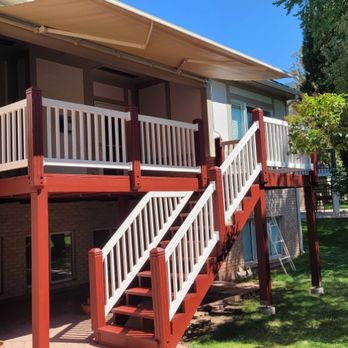 R&D Builders - Stained redwood deck, with vinyl handrail. - Decks & Railing Near Me - Clearfield, Utah