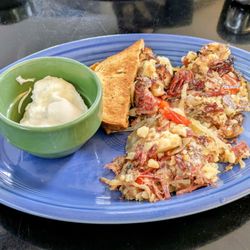 Rick's Restaurant - Poached Eggs with Corned Beef Hash.