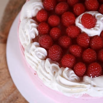 Blue Box Bakery - a strawberry cake with whipped cream and fresh raspberries - Bakeries Near Me - Salem, Oregon