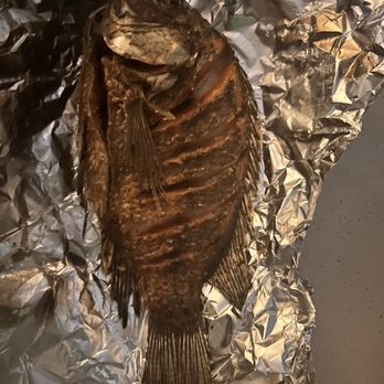 Antojitos Victoria - a fish on tin foil - Mexican Near Me - Santa Rosa, California Antojitos Victoria - a fish on tin foil - Mexican Near Me - Santa Rosa, California