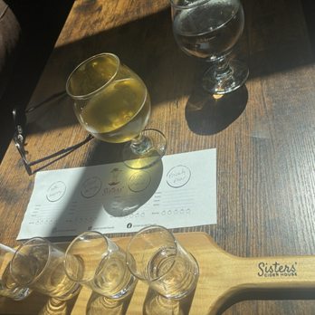 Sisters' Cider House - Flight - Cideries Near Me - Bainbridge Island, Washington Sisters' Cider House - Flight - Cideries Near Me - Bainbridge Island, Washington