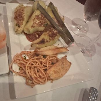 Russell's Steaks Chops & More - Stuffed Banana Peppers - Steakhouses Near Me - Williamsville, New York Russell's Steaks Chops & More - Stuffed Banana Peppers - Steakhouses Near Me - Williamsville, New York