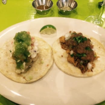 Chela & Garnacha - Pescado taco on the left. My favorite - light flaky cod, tastes fresh! - Mexican Near Me - Astoria, New York Chela & Garnacha - Pescado taco on the left. My favorite - light flaky cod, tastes fresh! - Mexican Near Me - Astoria, New York