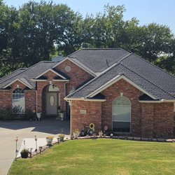 Shield Roofing and Contracting - New roof and gutter installation by Shield Roofing.