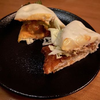 RAMEN-SAN - Pork belly bun (left), Fried Chicken Bun (right) - Ramen Near Me - Chicago, Illinois RAMEN-SAN - Pork belly bun (left), Fried Chicken Bun (right) - Ramen Near Me - Chicago, Illinois
