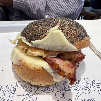 Daily Provisions - Upper West Side - Bacon egg and cheese on a poppyseed roll! Yum! - Cafes Near Me - New York, New York Daily Provisions - Upper West Side - Bacon egg and cheese on a poppyseed roll! Yum! - Cafes Near Me - New York, New York
