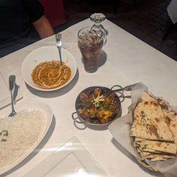 Muskaan Indian Cuisine - Plain basmati rice, butter chicken, aloo Gobi, and garlic naan. - Indian Near Me - Bakersfield, California Muskaan Indian Cuisine - Plain basmati rice, butter chicken, aloo Gobi, and garlic naan. - Indian Near Me - Bakersfield, California