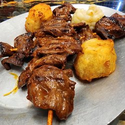 Anticuchos (grilled beef hearts)