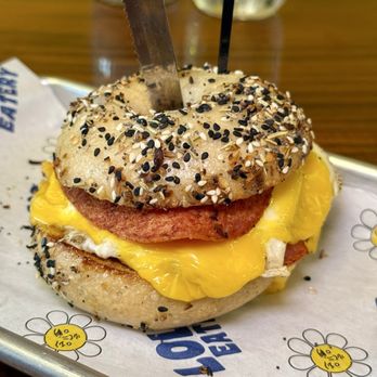 Lola's Eatery - the taylor gang - everything bagel, 2 fried eggs, 2 slices of AM cheese, with taylor gang sauce, & of course shipped-in "taylor ham" - Breakfast & Brunch Near Me - Pittsburgh, Pennsylvania