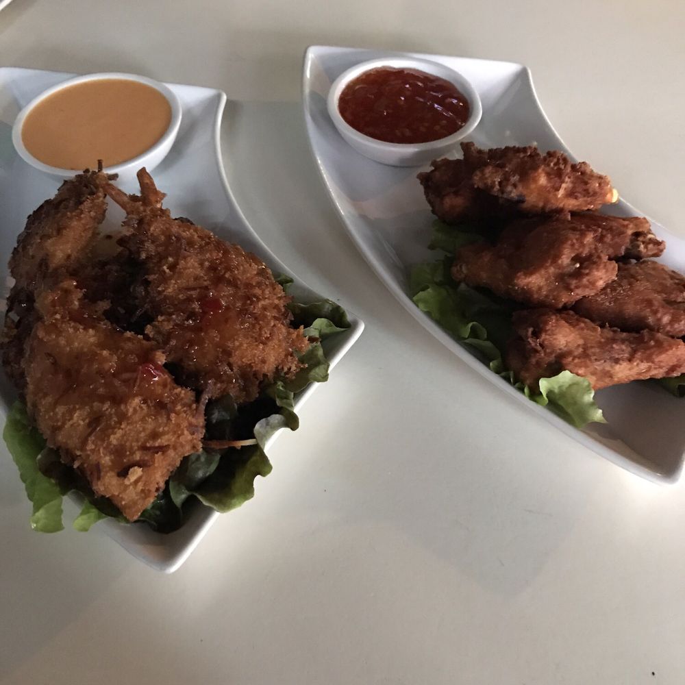 Silom 12 - Coconut shrimp and garlic chicken wings appetizers - Thai Near Me - Chicago, Illinois Silom 12 - Coconut shrimp and garlic chicken wings appetizers - Thai Near Me - Chicago, Illinois