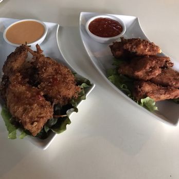 Silom 12 - Coconut shrimp and garlic chicken wings appetizers - Thai Near Me - Chicago, Illinois Silom 12 - Coconut shrimp and garlic chicken wings appetizers - Thai Near Me - Chicago, Illinois