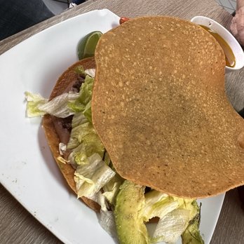 Tostada Regia North Side - Tostadas are huge. This is the bistec - Mexican Near Me - Houston, Texas Tostada Regia North Side - Tostadas are huge. This is the bistec - Mexican Near Me - Houston, Texas