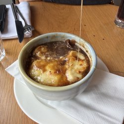 Côte Brasserie - Cheesy good French onion soup!! Note the cheese pull