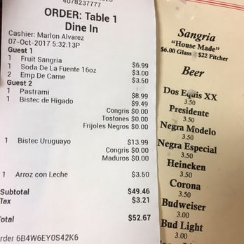 Old Cuban Cafe - Glass of sangria is $6 on the menu versus $6.99 on my receipt...but server made up for it with free coffee :) - Cafes Near Me - Orlando, Florida