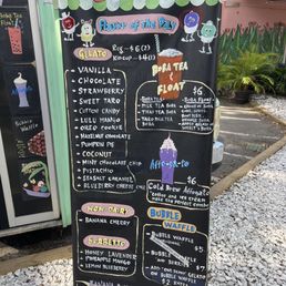 a chalk board with a menu on it