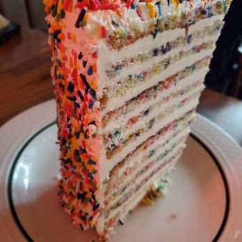 Maison Pickle - Confetti 24 layer cake - Cocktail Bars Near Me - New York, New York Maison Pickle - Confetti 24 layer cake - Cocktail Bars Near Me - New York, New York