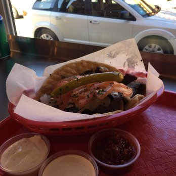 Zaatar MedGrill - Gyro sandwich with hot sauce, tahini, and tzatziki sauce - Mediterranean Near Me - Chicago, Illinois