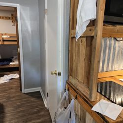 Bunk beds were uncomfortable and the top bunks only held 130 pounds or less. (sign posted)