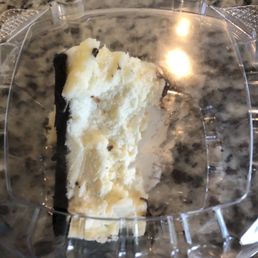 Badly cut peanut butter cheesecake. Badly cut peanut butter cheesecake.