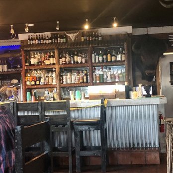 Buffalo Nickel - Quaint inside dinning room with cozy outdoor garden tables. - Pizza Near Me - Avalon, California Buffalo Nickel - Quaint inside dinning room with cozy outdoor garden tables. - Pizza Near Me - Avalon, California