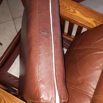 Florida Drapes & Upholstery - Paid for new leather and the chair was returned like this. - Furniture Reupholstery Near Me - Orlando, Florida