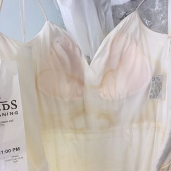 Tweeds Dry Cleaning - They didn't even get the sweat marks out! I don't think they even cared to look inside the dress! Also there is makeup on the straps still! - Laundry Services Near Me
