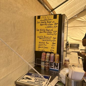 The Fish Basket - a menu on a table - Food Stands Near Me - Munising, Michigan The Fish Basket - a menu on a table - Food Stands Near Me - Munising, Michigan