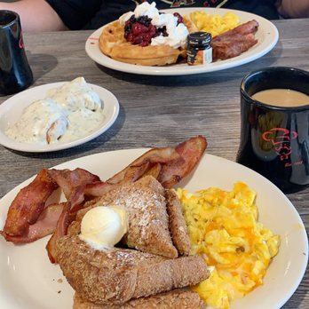 Biscuits Cafe - Almond crusted French toast and berry waffle. With a biscuit and gravy on the side. - Breakfast & Brunch Near Me - Peoria, Arizona