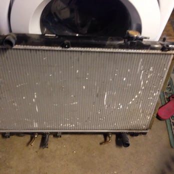 Md Auto Repair And Tires - My radiator with the cracked plastic with the water leaked out and the missing brass pieces from the side - Auto Repair Near Me - Spring Valley, California Md Auto Repair And Tires - My radiator with the cracked plastic with the water leaked out and the missing brass pieces from the side - Auto Repair Near Me - Spring Valley, California