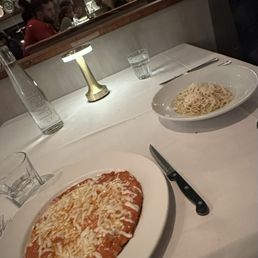 Tagliolini Cacio e Pepe and Pollo Alla Milanese (chicken parm)