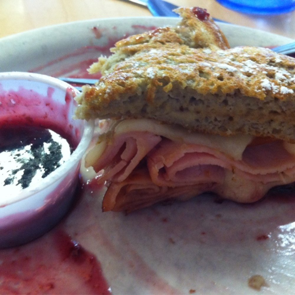 Peppermill Cafe - Almost finished Monte Cristo. It was so awesome I couldn't stop eating to take a picture. - Breakfast & Brunch Near Me - Grand Rapids, Michigan