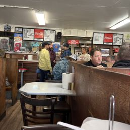 Inside of Johnnie's with one of the owners, Craig, in blue shirt. Inside of Johnnie's with one of the owners, Craig, in blue shirt.