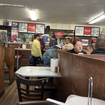 Johnnie's Drive In - Inside of Johnnie's with one of the owners, Craig, in blue shirt. - Barbeque Near Me - Tupelo, Mississippi Johnnie's Drive In - Inside of Johnnie's with one of the owners, Craig, in blue shirt. - Barbeque Near Me - Tupelo, Mississippi