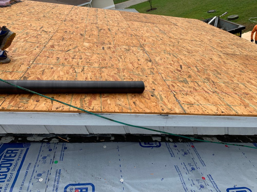 Slide of EZ Roofing of Flagler County