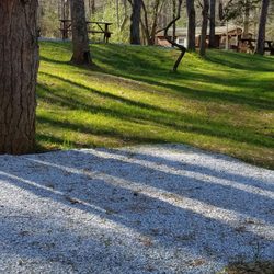Rose Creek Campground & Cabins - Pea gravel pads for tents